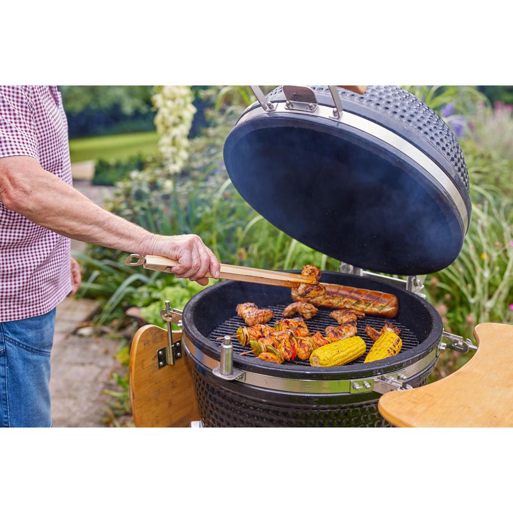 De tekst ist korrekt in die niederländische Sprache übersetzt. Hier ist der Text unverändert: Houten barbecuetang Opener met flesopener, 43 cm.